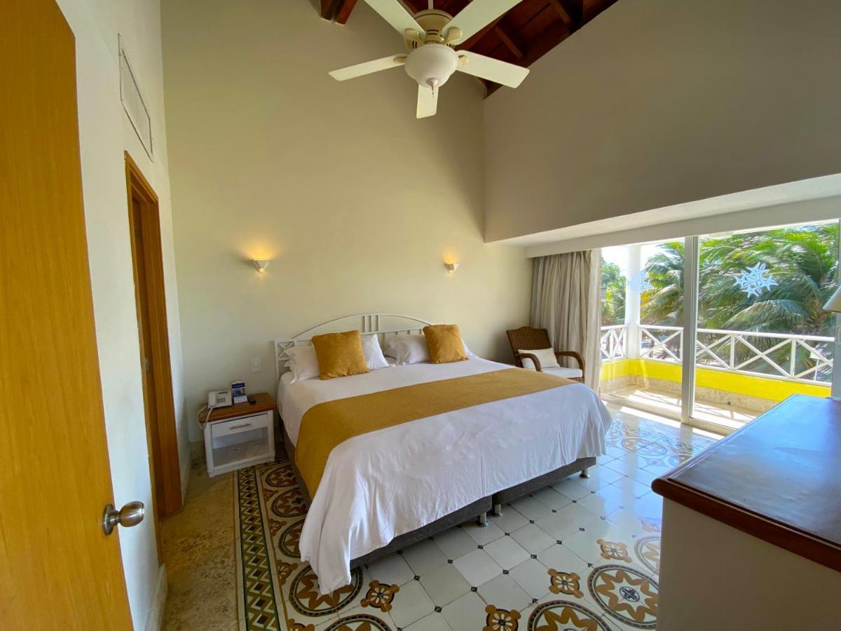 Hotel Las Americas Casa De Playa Cartagena  Exterior foto A bedroom at the hotel